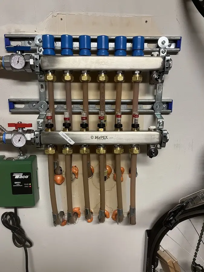 Plumber performing Water Heater Repair at a residential property in East Basin